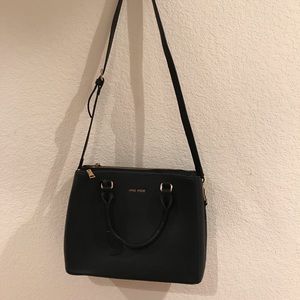 Woman’s black classy satchel